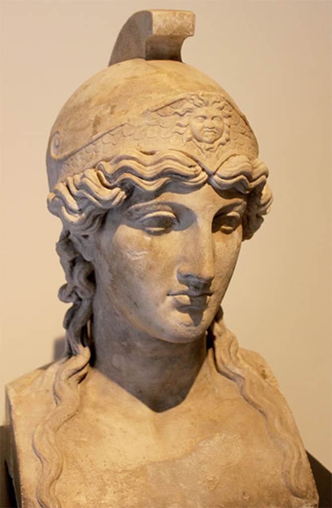 Villa dei Papiri, Herculaneum. Marble herm of Athena.
Found in 1757, north side of the pond.
Now in Naples Archaeological Museum. Inventory number 6322.
Photo courtesy of Miguel Hermoso Cuesta. Own work. Wikimedia CC by SA 3.0 licence